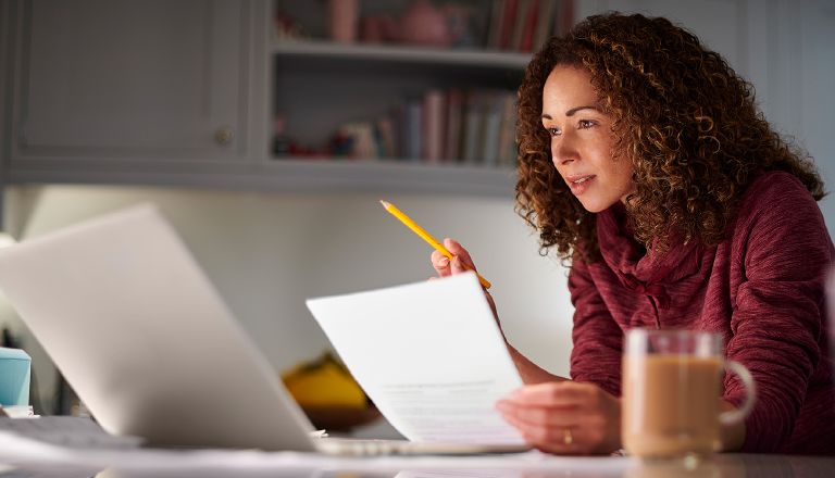 A woman studying at a desk