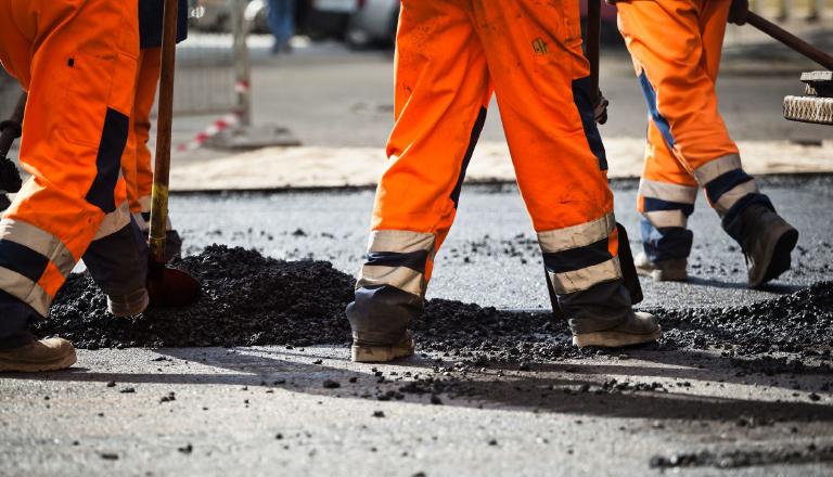 Two National Highways workers